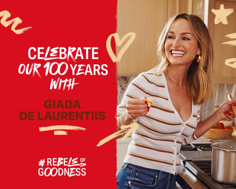 celebrate our 100 years with Giada De Laurentiis #Rebels of goodness; Giada De Laurentiis cooking pasta in the kitchen