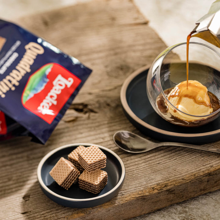 Quadratini Chocolate, Creme-Filled Wafer Cookies, 8.82 oz. Bag with affogato and spoon next to it.