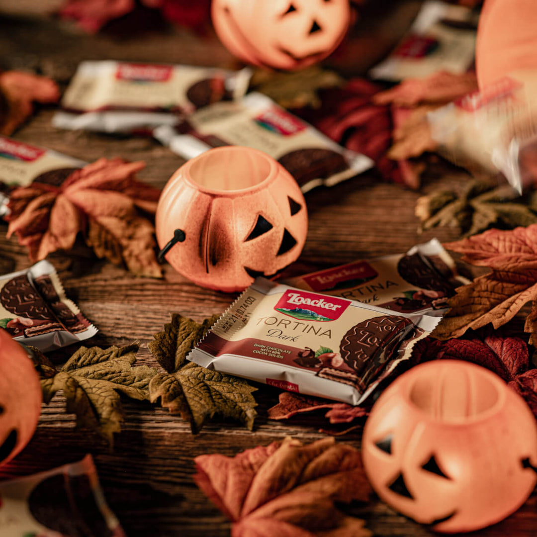 Tortina Dark, Chocolate Coated Wafer Specialty, 4.44 oz. Box in Halloween background.