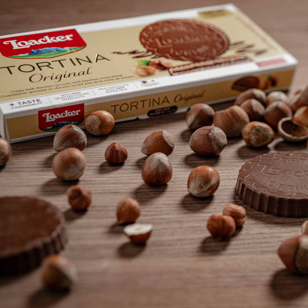 Tortina Original, Chocolate Coated Wafer Specialty, 4.44 oz. Box with hazelnuts closed up