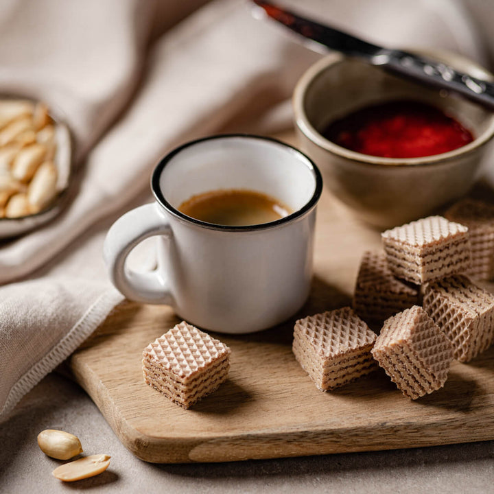 Quadratini Peanut Butter, Creme-Filled Wafer Cookies, 8.82 oz. Bag with coffee next to it